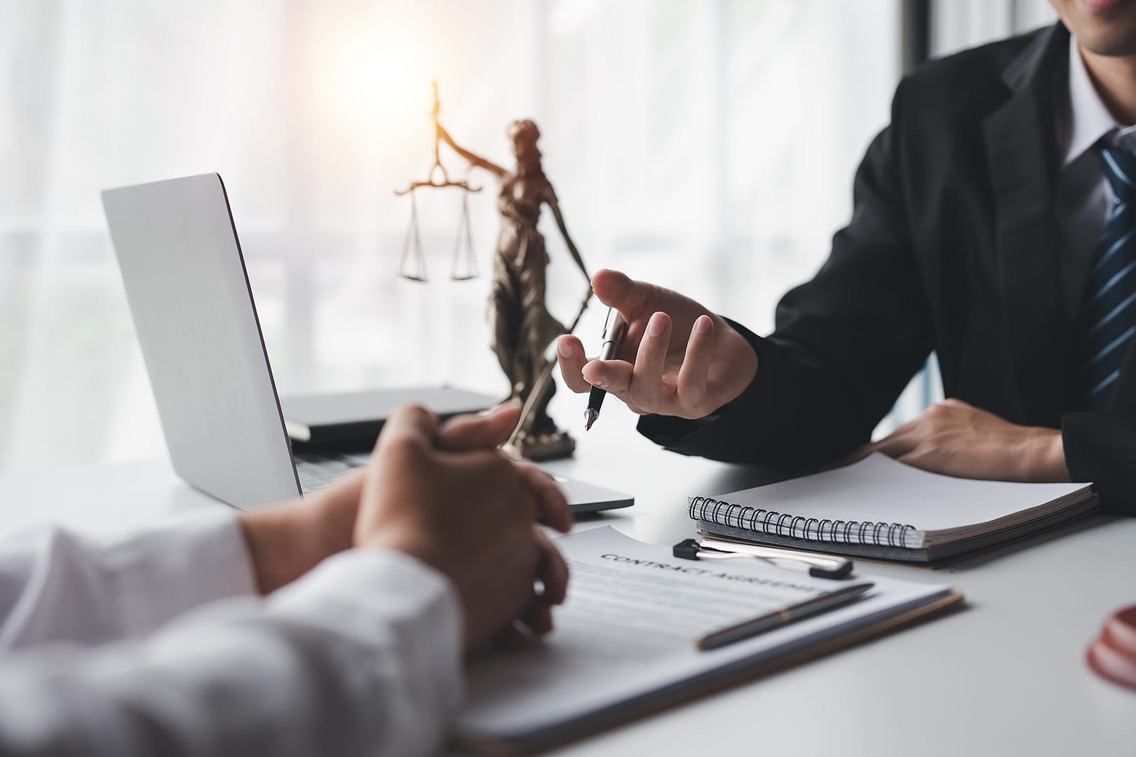 Businessman and lawyer discuss and advice on contract documents. Businessman and lawyer discuss and advice on contract documents. Legal Treaty Agreement business contract